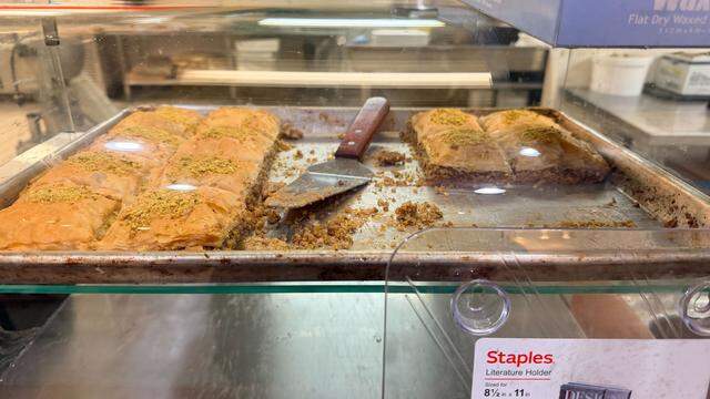 New restaurant Mediterranean Spice serves up fresh baked baklava in a glass display.